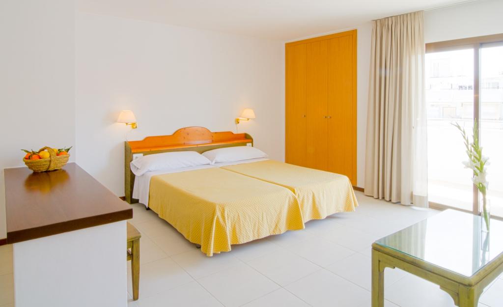 Surf and book in few minutes: ⛲ Beautiful quiet holiday apartments in Santa Eulalia, almost on the beach. Excellent location (in the center) for a quiet holiday