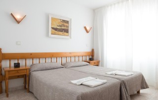 Cozy Apartment with Pool on the beach S.ta Eulalia bedroom 2 1 - LeibTour: TOP aparthotels in Ibiza