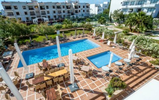 Luxury Playa den Bossa Ibiza Modern Studio Apartment PLAYA DEN BOSSA IBAPPRE Overview pool2 1 - LeibTour: TOP aparthotels in Ibiza