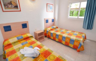 Playa den Bossa apartment pool 3 guests Ibiza PLSOLAP Bedroom - LeibTour: TOP aparthotels in Ibiza