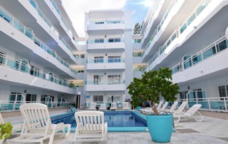 Playa den Bossa apartment pool 3 guests Ibiza PLSOLAP Pool 2 - LeibTour: TOP aparthotels in Ibiza