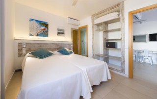Water park pool apartment on the beach SAN ANTONIO BAY PLBESAN Bedroom - LeibTour: TOP aparthotels in Ibiza